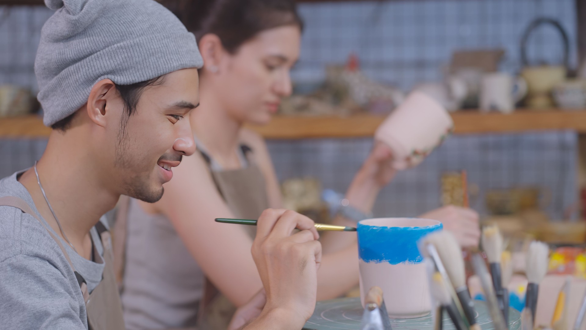 Artisans Painting Pottery in Studio, SME Business owner